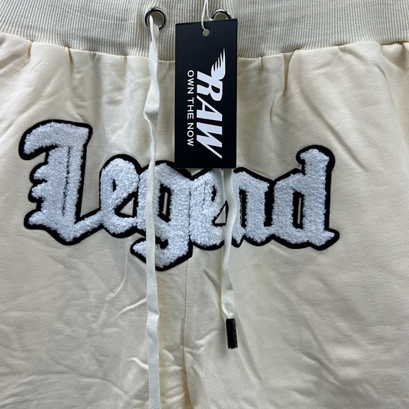 RAW OWN THE NOW MENS SIZE MEDIUM CREAM GRAPHIC PATCH LEGEND 2 POCKET SHORTS - Picture 4 of 9